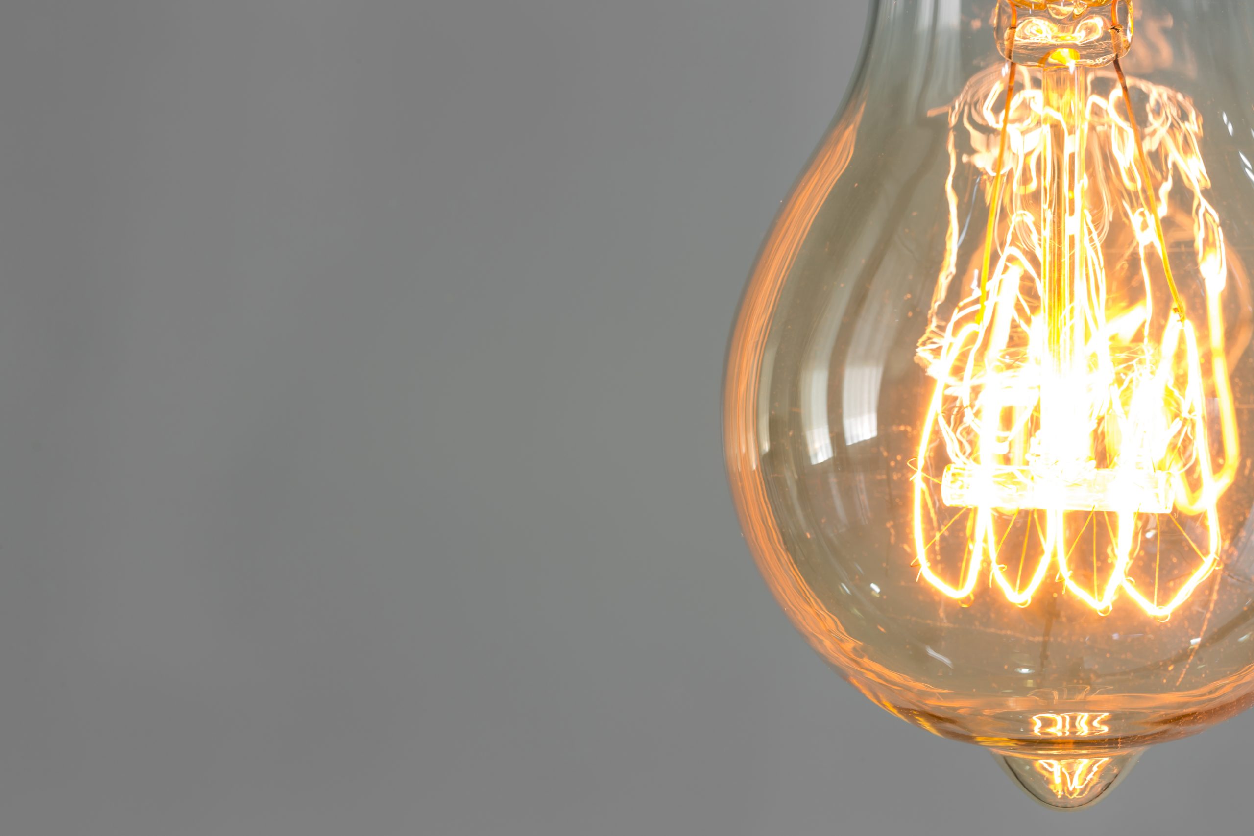 Close up of vintage glowing light bulb